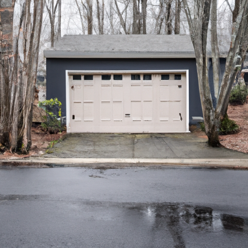 Suburban Sudbury home with a modern sectional garage door partially open on a wet driveway, early spring setting.